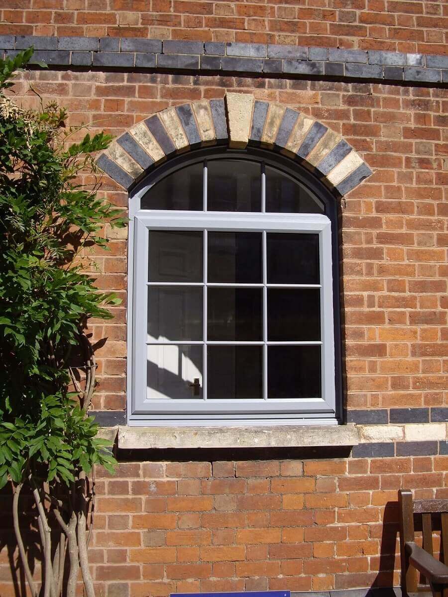 Silver grey arched top window