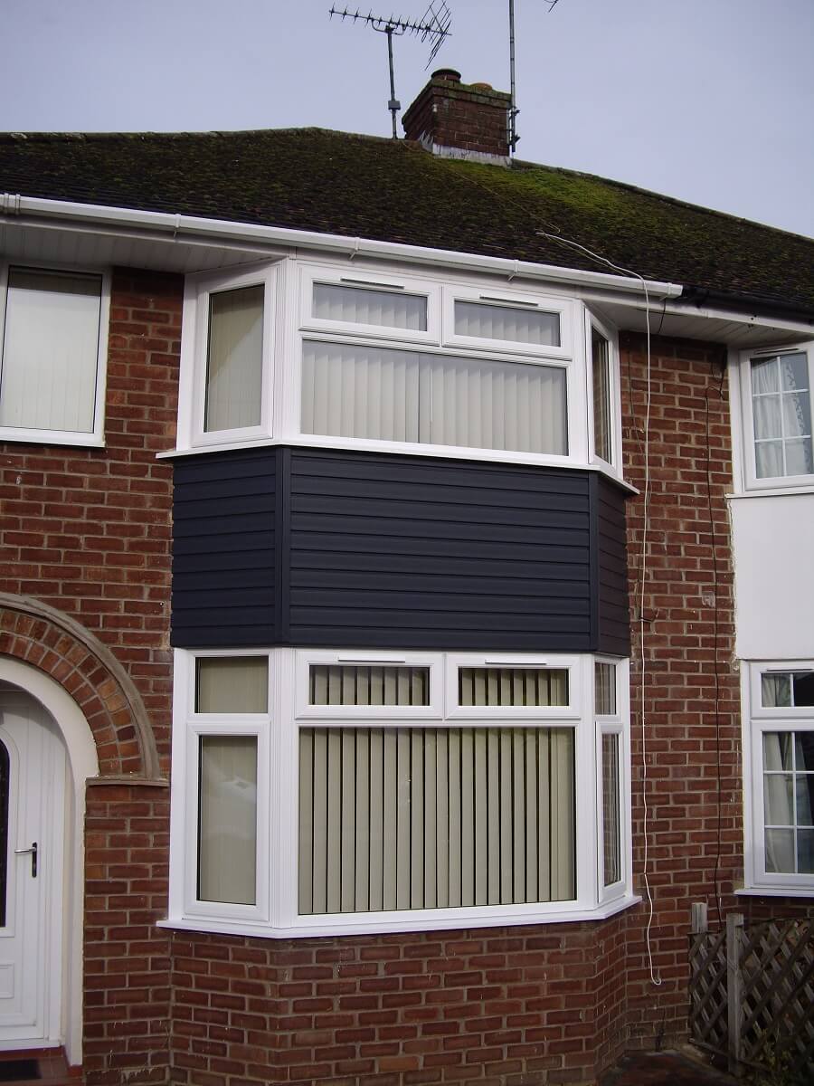 White PVCu windows and contrasting cladding